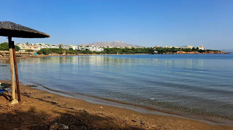 Marikes beach near Rafina — sand and rock with clear water