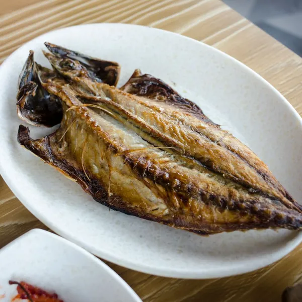 Small fried fish on a plate